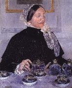 Woman beside tea-table